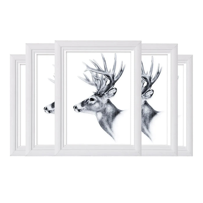 Cadre photo 18x24 bois gris clair sur mur blanc