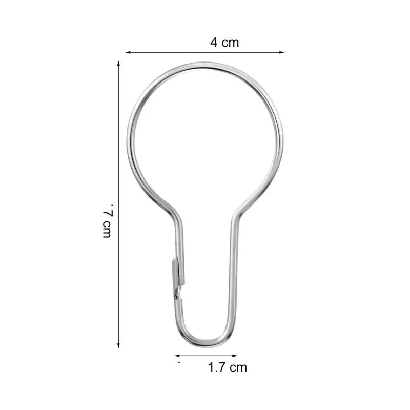 Image technique affichant les dimensions d’un crochet métallique pour rideaux : 7 cm de long, 4 cm de large.