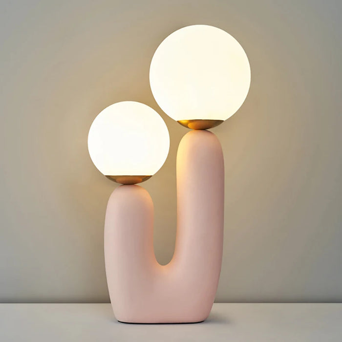 Lampe de chevet en verre minimaliste moderne avec lumière rouge sur table de nuit