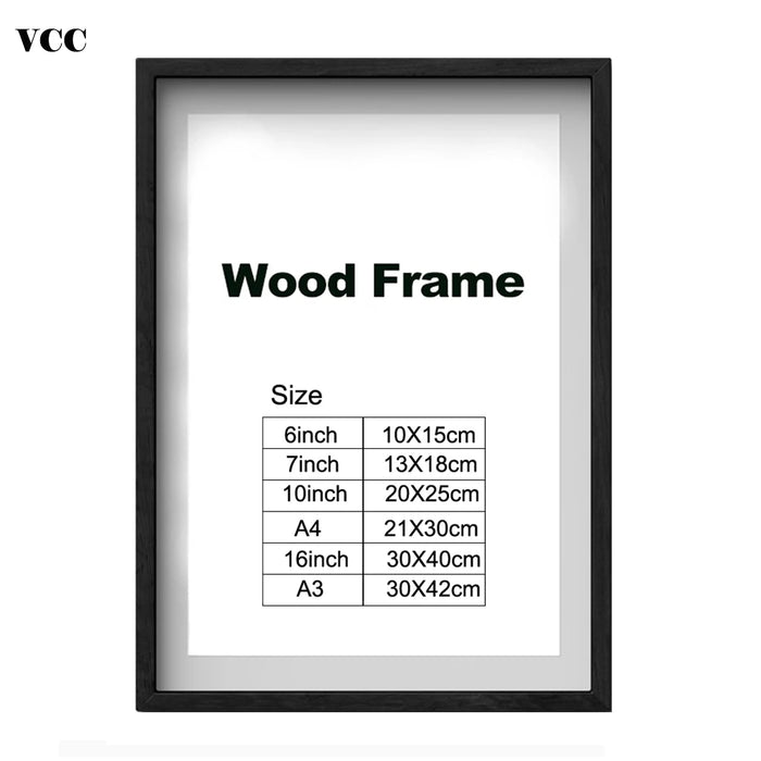 Cadre photo A3 en bois classique noir sur mur blanc