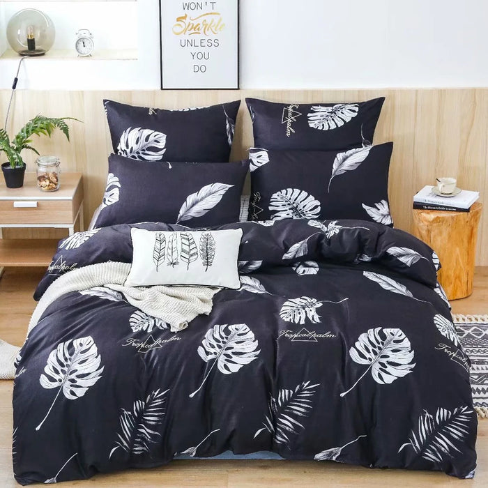 Parure de lit 140x200 en polyester sergé noir sur un lit moderne