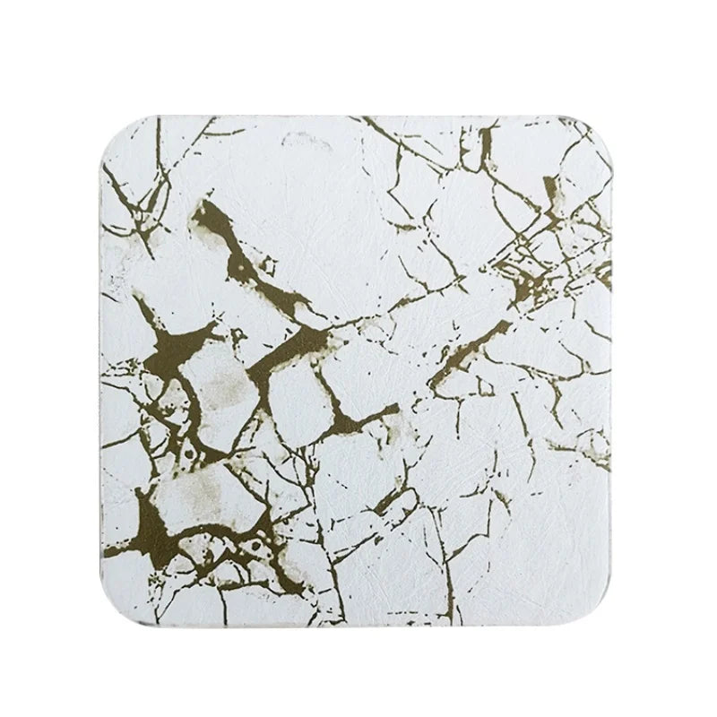 Motif marbrure vintage en noir et blanc avec des formes irrégulières donnant un style industriel.