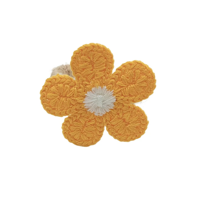 fleurs crochetées main artisanale tringle decoration table mariage pique nique brunch après midi thé