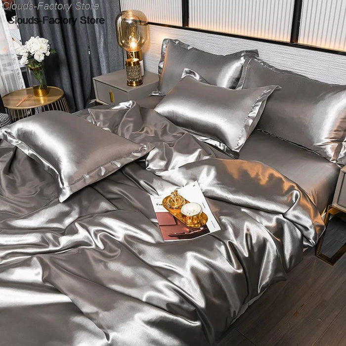 Parure de lit satin 160x200 violet sur un lit moderne