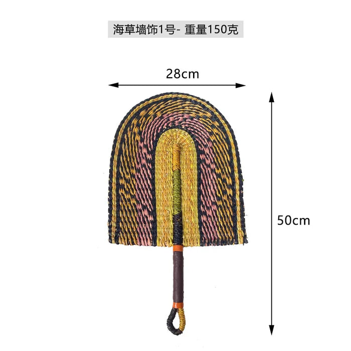 décoration murale éventail pliant multicolore motifs géométriques tissage fibre naturelle anneaux métalliques traditionnelle artisanale