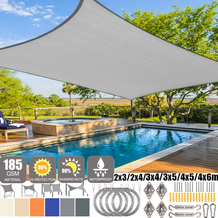 Voile d'ombrage rectangulaire blanche sur une terrasse