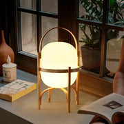 lampe table moderne bois blanc lisse structure dorée ambre lumière