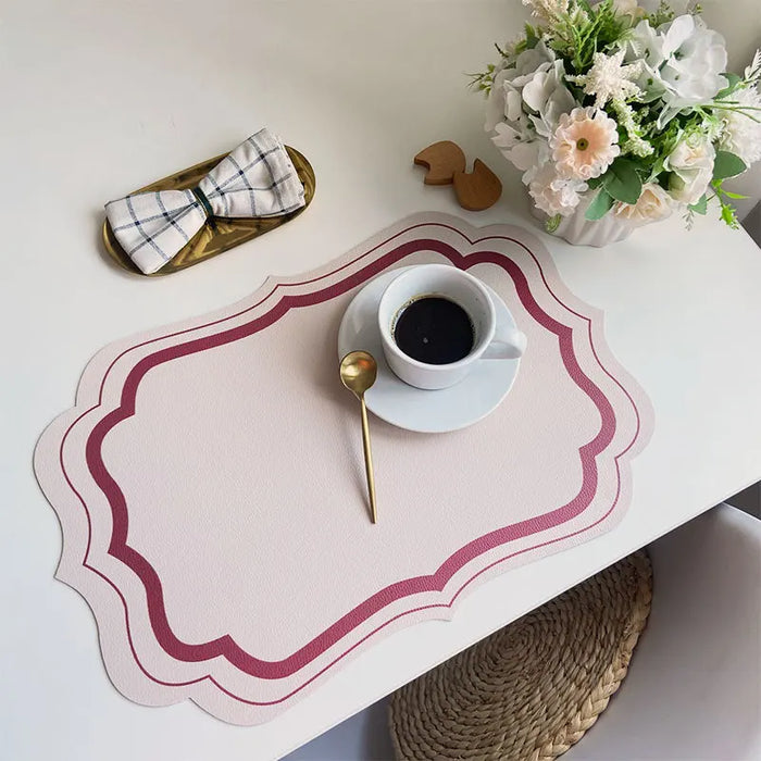 serviettes table moderne motif géométrique rose clair vert bleu beige ornementées