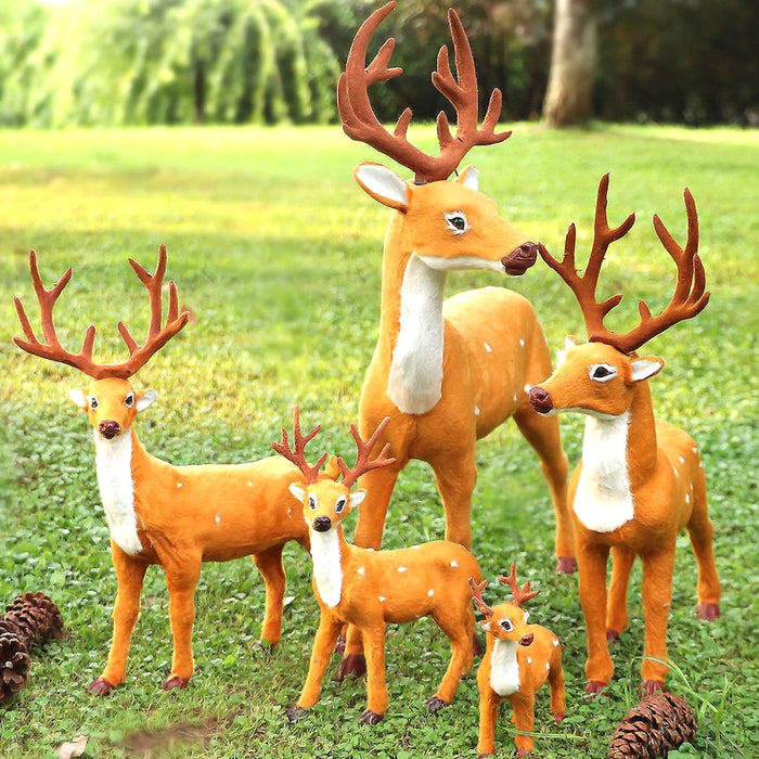Renne de Noël en peluche gris clair pour décoration de vitrine