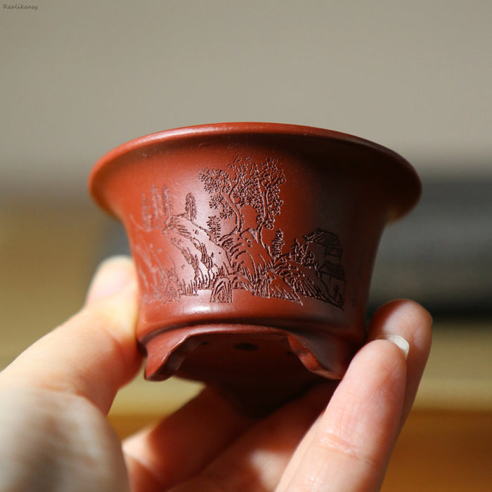 pots decoratifs classiques caches pots relief paysage arbres oiseaux rouge noir vert beige sculptes