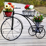 support plante forme vélo métal ajouré vintage plusieurs paniers fleurs artificielles rouille orange turquoise