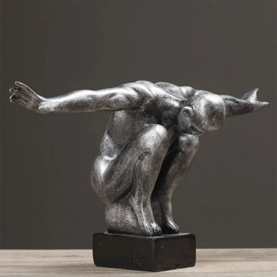 Sculpture d'art corporel humain en résine gris clair sur table en bois