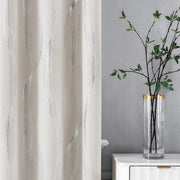 rideau moderne beige motifs argentés semi translucide élégant tringle branches feuilles table basse