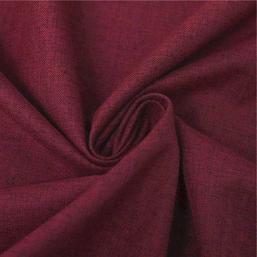 Image d'un tissu rouge bordeaux idéal pour la confection de vêtements et accessoires. Parfait pour des projets de couture chic et élégant.