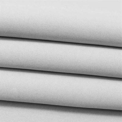 Empilement de textiles blancs, idéal pour la confection et la décoration intérieure, utilisé dans la création de divers articles ménagers et accessoires créatifs haut de gamme.