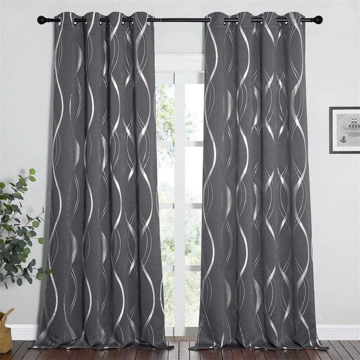 Paire de rideaux gris anthracite avec motifs géométriques modernes, idéale pour ajouter une touche élégante à votre salon. Ces rideaux occultants garantissent une ambiance tamisée en bloquant efficacement la lumière extérieure. Parfaits pour une décoration intérieure contemporaine, ces rideaux apportent à la fois style et fonctionnalité à n'importe quelle pièce. Faciles à installer grâce aux œillets intégrés sur une tringle standard.