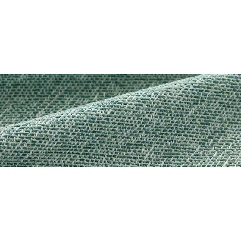Texture de tissu vert clair, idéale pour la décoration intérieure, offrant un aspect élégant et moderne pour divers projets d'aménagement. Parfait pour la confection de housses de coussins ou de rideaux.
