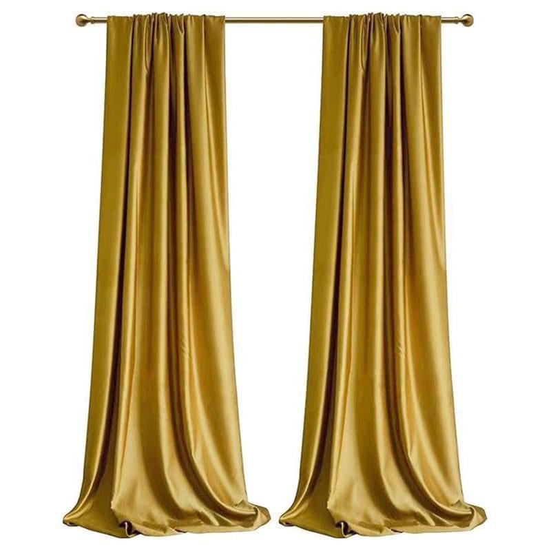 Rideaux élégants dorés pour salon, design moderne et chic, parfaits pour ajouter une touche de luxe et de sophistication à votre intérieur. Idéal pour l'aménagement de votre espace de vie avec style et élégance, offrant une ambiance chaleureuse et accueillante.