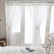rideau bohème blanc texturé franges translucide chambre bébé tringle inclusion porte fenêtre lit couette