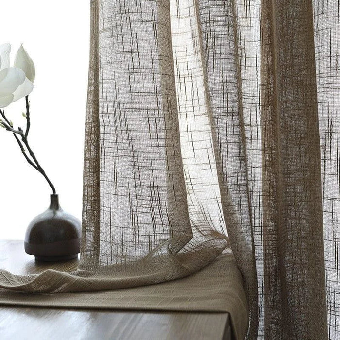 Rideaux élégants translucides de couleur beige clair, parfaits pour ajouter une touche de sophistication à votre intérieur. Ces rideaux laissent passer la lumière naturelle tout en préservant l'intimité, idéals pour le salon ou la chambre. Leur design moderne s'harmonise facilement avec une variété de styles de décoration, créant une ambiance chaleureuse et accueillante dans chaque pièce.