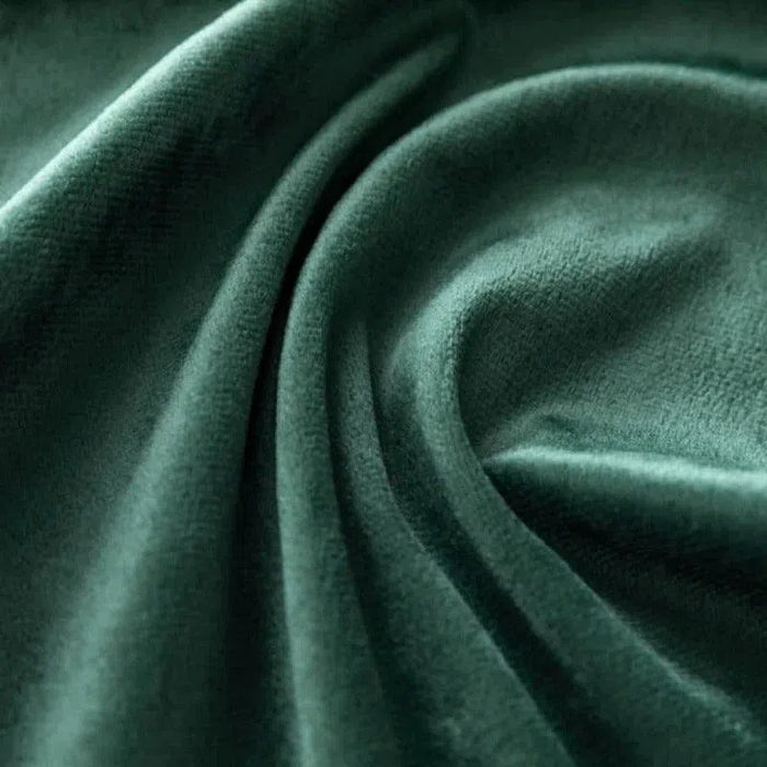 Rideau élégant vert foncé ondulé, idéal pour ajouter une touche de sophistication et de confort à votre intérieur. Ce rideau moderne et stylé s'adapte parfaitement aux salons, chambres ou bureaux, apportant une ambiance chaleureuse et accueillante.