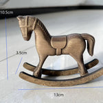décoration cheval bascule bois vintage miniature bronze marron foncé aspect vieilli texture rugueuse figurine