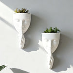 décoration murale moderne cache plantes masque blanc noir résine art contemporain texture granuleuse