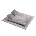 literee miniature bleu marine gris clair tissu texturé minimaliste moderne couverture oreillers bois naturel