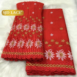 tissu dentelle traditionnelle fleurs roses jaunes vert foncé rouge bleu clair mariage occasion formelle