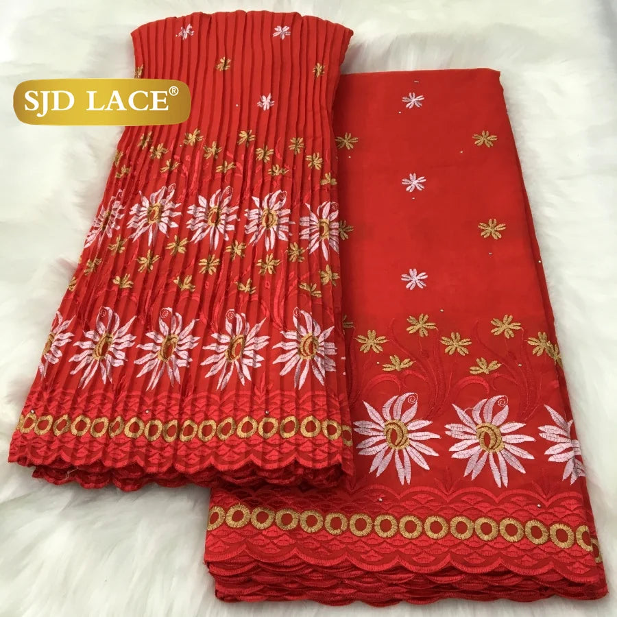tissu dentelle traditionnelle fleurs roses jaunes vert foncé rouge bleu clair mariage occasion formelle