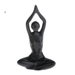 ornements deco moderne figurines yoga noires differentes poses minimaliste sculptural