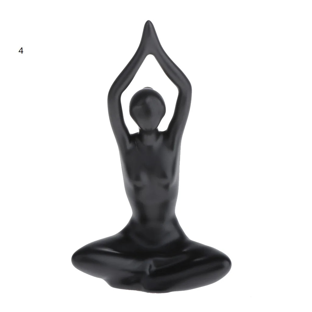 ornements deco moderne figurines yoga noires differentes poses minimaliste sculptural