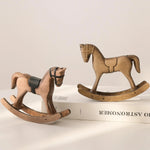 décoration cheval bascule bois vintage miniature bronze marron foncé aspect vieilli texture rugueuse figurine