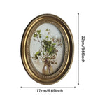 cadre photo ovale orné motif floral peint vintage décoratif decoration ornemental
