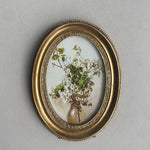 cadre photo ovale orné motif floral peint vintage décoratif decoration ornemental