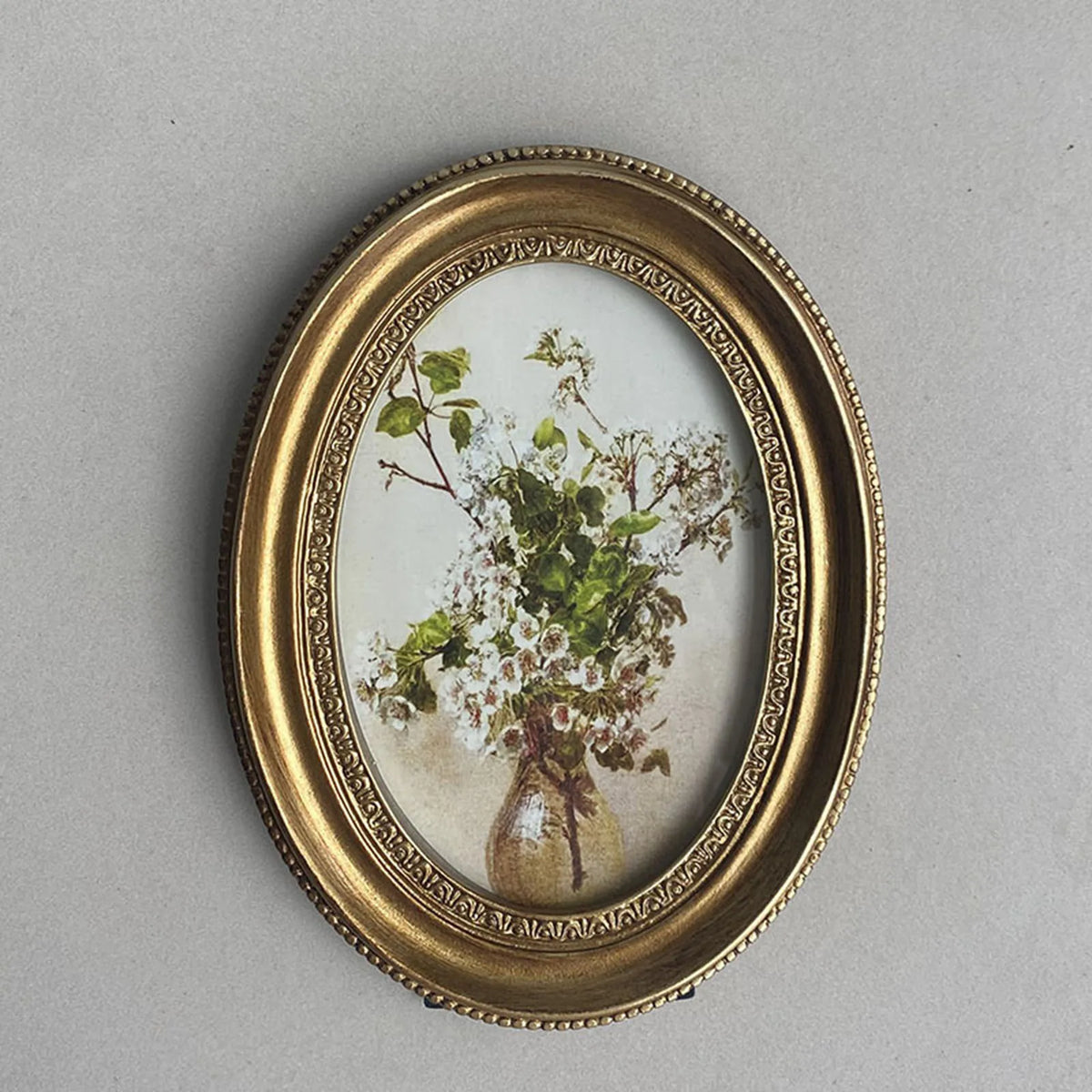 cadre photo ovale orné motif floral peint vintage décoratif decoration ornemental