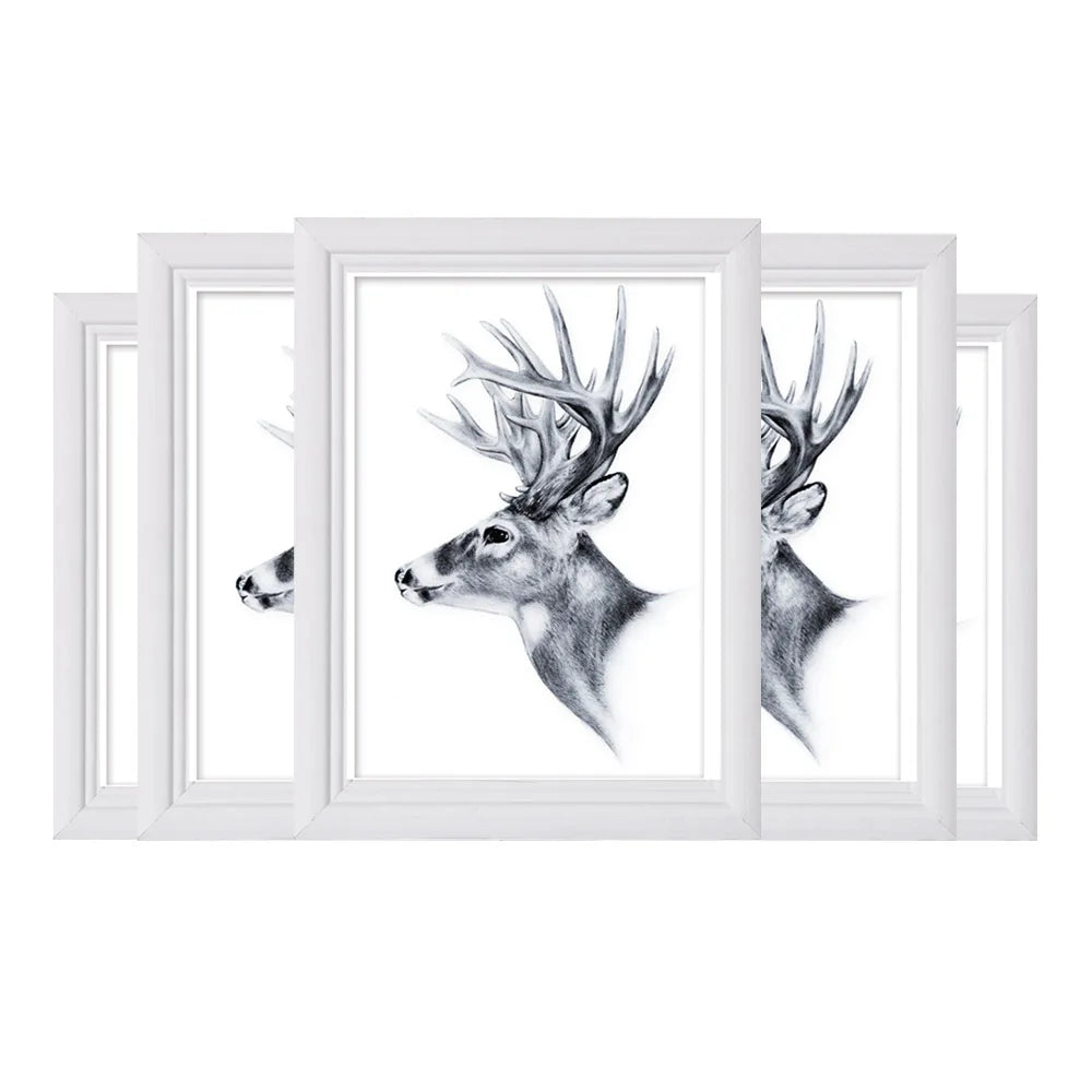 Cadre photo 18x24 bois gris clair sur mur blanc