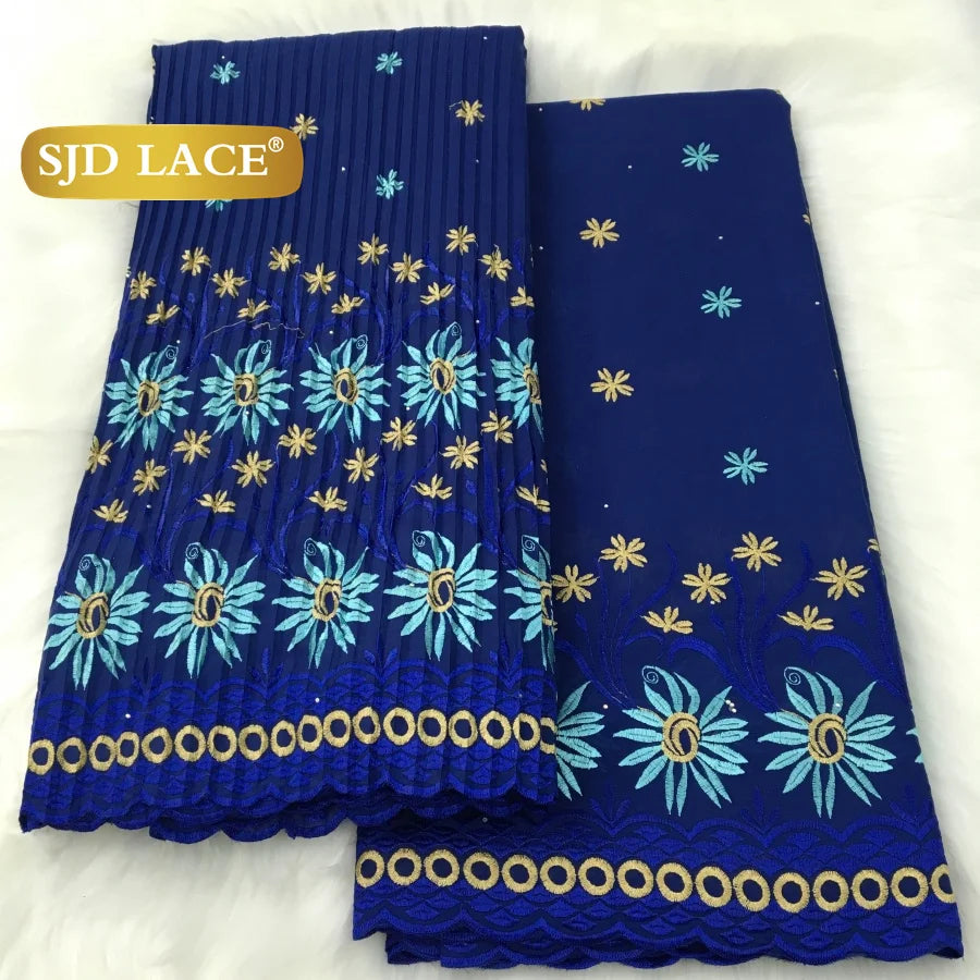 tissu dentelle traditionnelle fleurs roses jaunes vert foncé rouge bleu clair mariage occasion formelle