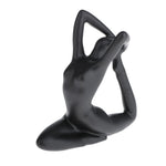 ornements deco moderne figurines yoga noires differentes poses minimaliste sculptural
