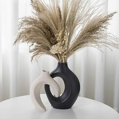 vases céramique modernes minimalistes abstraits ouvertures circulaires couleurs neutres sculptural