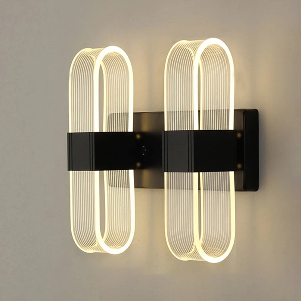 Détail de l'applique murale LED montrant sa structure elliptique