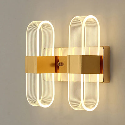 Applique murale LED elliptique design moderne en métal et acrylique