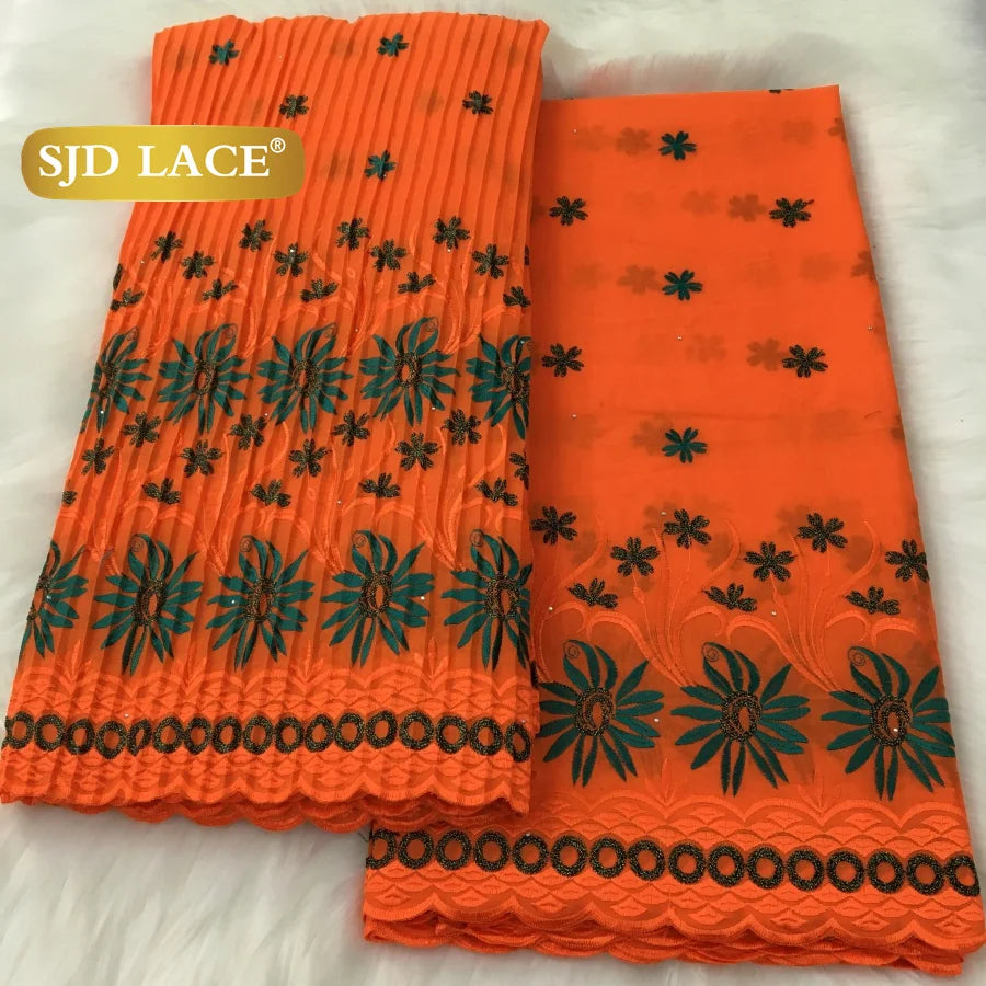 tissu dentelle traditionnelle fleurs roses jaunes vert foncé rouge bleu clair mariage occasion formelle
