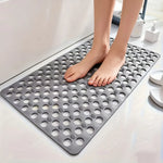 tapis bain douche gris vert perforations anti dérapage moderne salle bain ventilation trous ronds