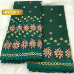 tissu dentelle traditionnelle fleurs roses jaunes vert foncé rouge bleu clair mariage occasion formelle