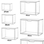 boîtes rangement transparentes grandes capacités poignées divers objets figurines collections livres minimalistes