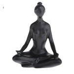 ornements deco moderne figurines yoga noires differentes poses minimaliste sculptural