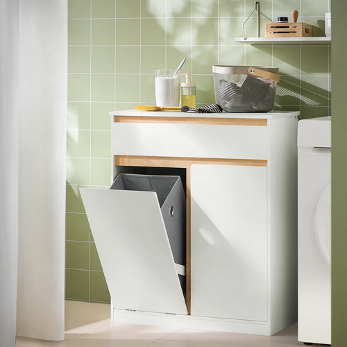 Meuble salle de bain blanc avec panier à linge et tiroir