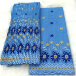 tissu dentelle traditionnelle fleurs roses jaunes vert foncé rouge bleu clair mariage occasion formelle