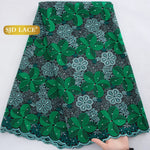 tissu dentelle brodée fleurs paillettes couleurs bleu vert rose occasion mariage party